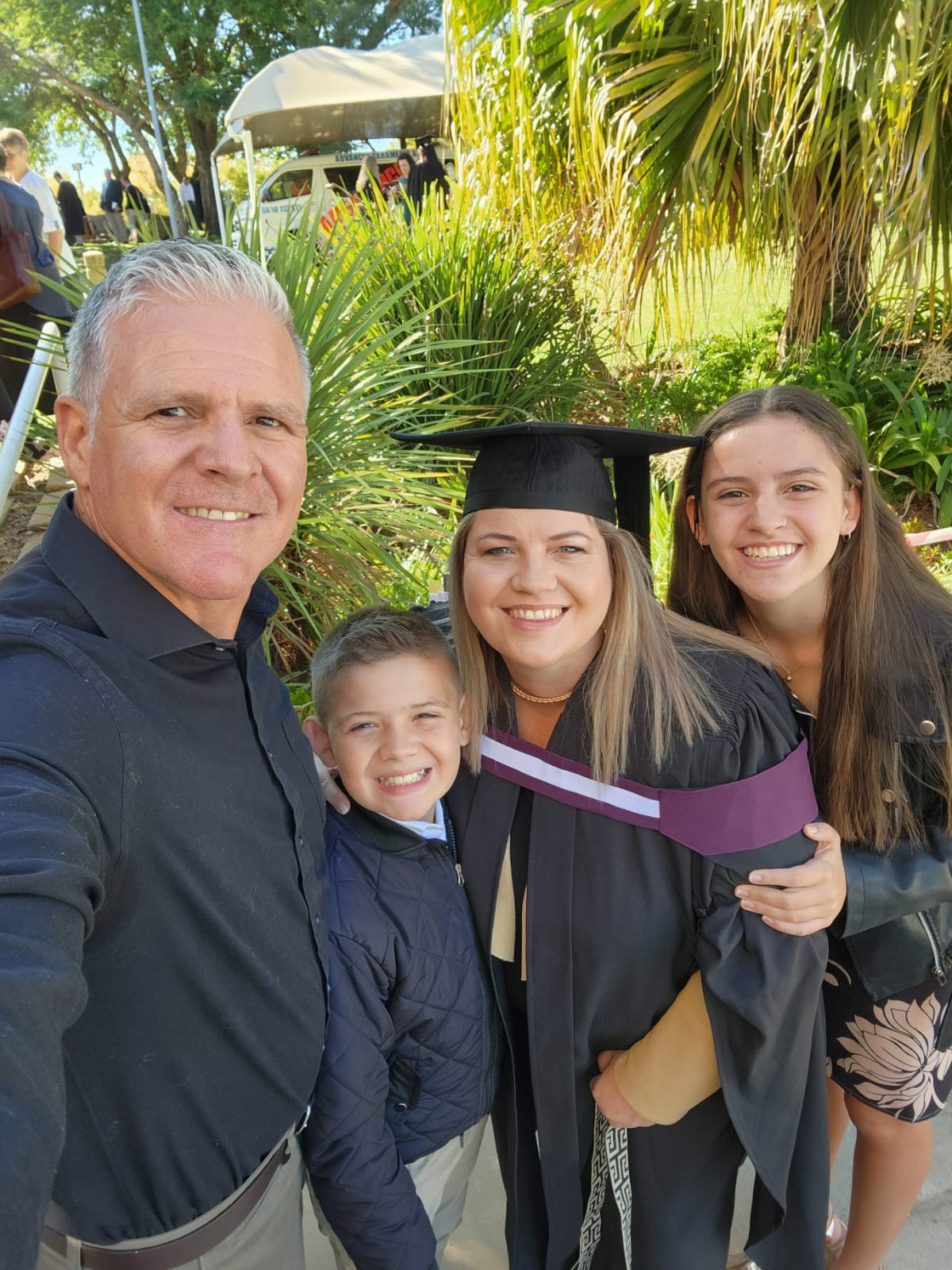 Jean-Marí Cornelius celebrates completion of her studies with her husband, Rian, their son Xavier and daughter Kayla. Pic Supplied by Akademia